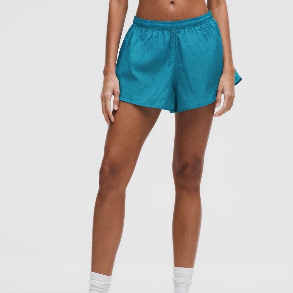 lululemon dolphin hem mid-rise running shorts